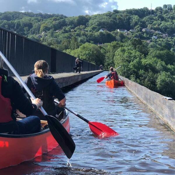 Groups Canoeing down an Aqueduct
