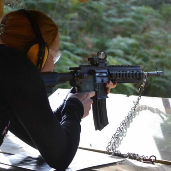 Close up of a woman wearing ear defenders and safety goggles Assault Rifle Shooting