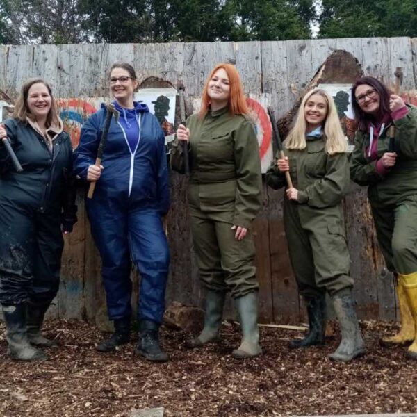 Axe Throwing group, 5 ladies holding axes