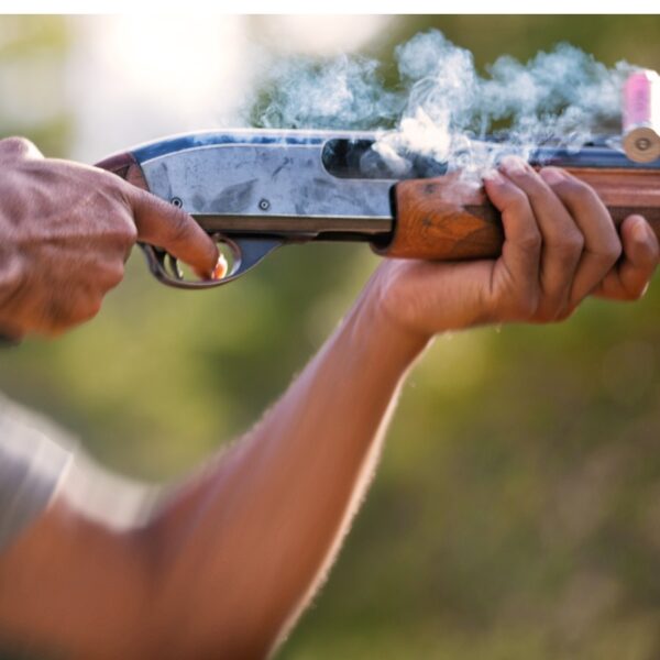 A close up smoking barrel of a gun from Clay Pigeon Shooting