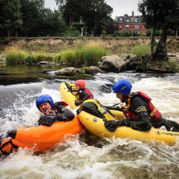3 people going down rapids on their River Bugging Gift Experience Day