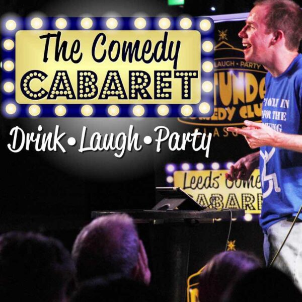 A stand up comedian at The Comedy Cabaret