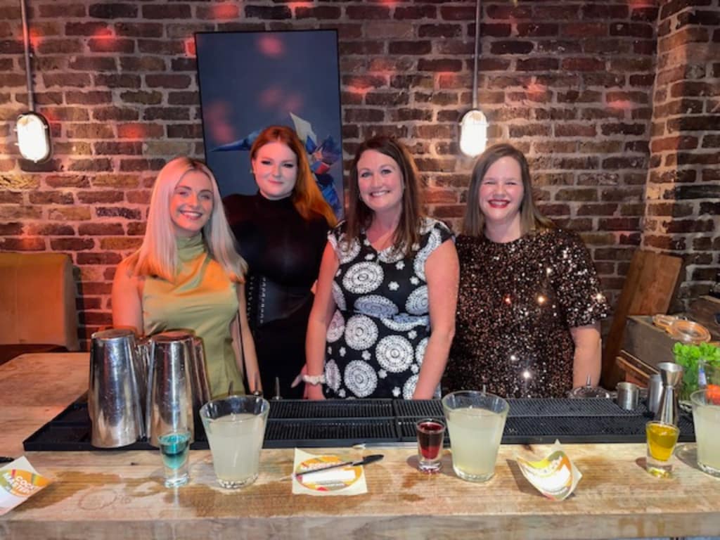 The DesignaVenture Gift Experience Team experiencing Cocktail making
