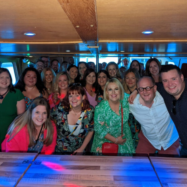 Group enjoying a party boat cruise in Cardiff